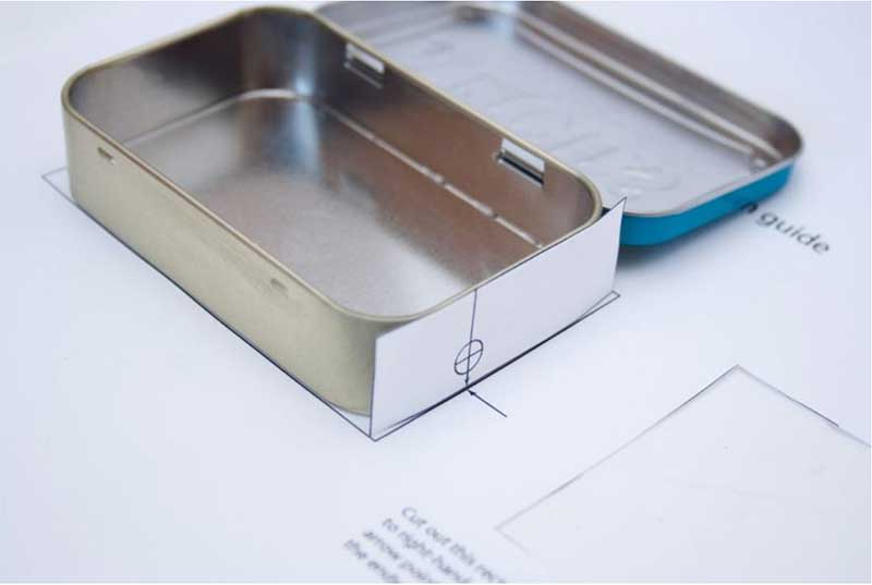 Mark the location on the tin for the audio jack hole.